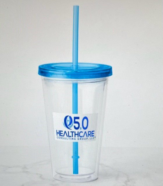 A cup with a straw and the logo of o 5 0 healthcare.