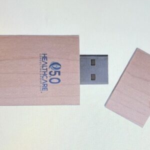 A wooden usb stick with the logo of 5 0 healthcare.